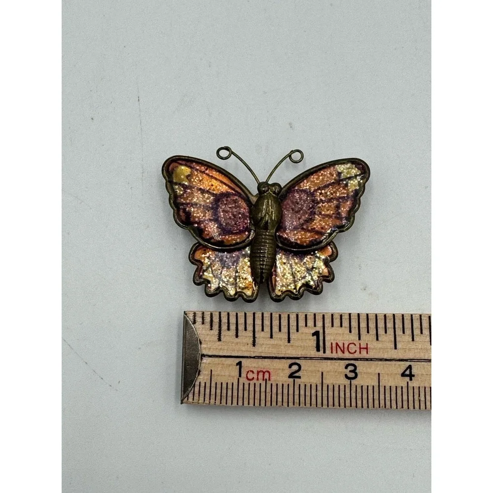 Vintage Fold Tone Butterfly Magnet With Glittery Orange & Purple Wings